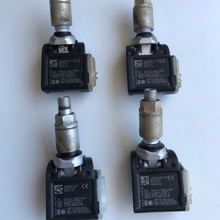 Load image into Gallery viewer, Set of 4 BMW OEM Tire Pressure System TPMS A0009052102 b56b6d9d