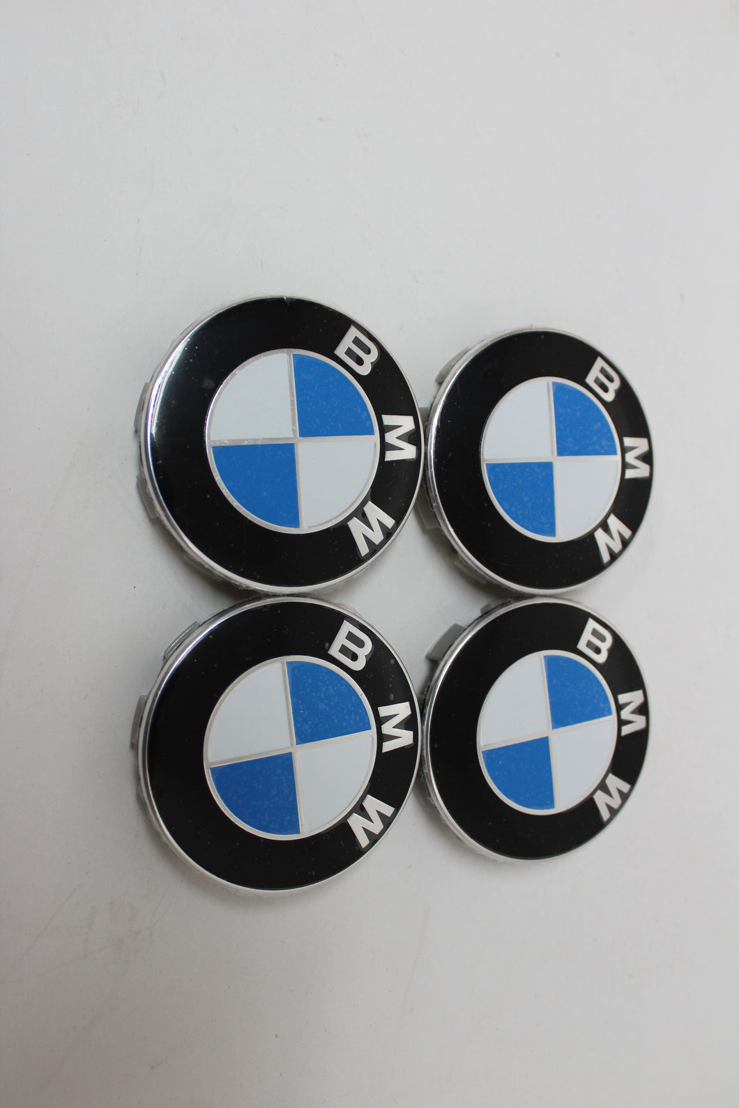 SET OF 4 GENUINE BMW CENTER CAPS