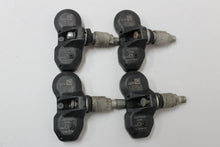 Load image into Gallery viewer, SET OF 4 GENUINE BMW FACTORY OEM TIRE PRESSURE TPMS SENSORS